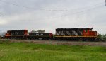 CN 7526/526/7503 pulling a string of mixed freight tank cars, covered hoppers and Autoracks W/B out of the Cloverbar Yard